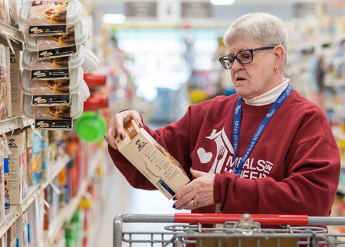 Volunteer grocery shopping for a client