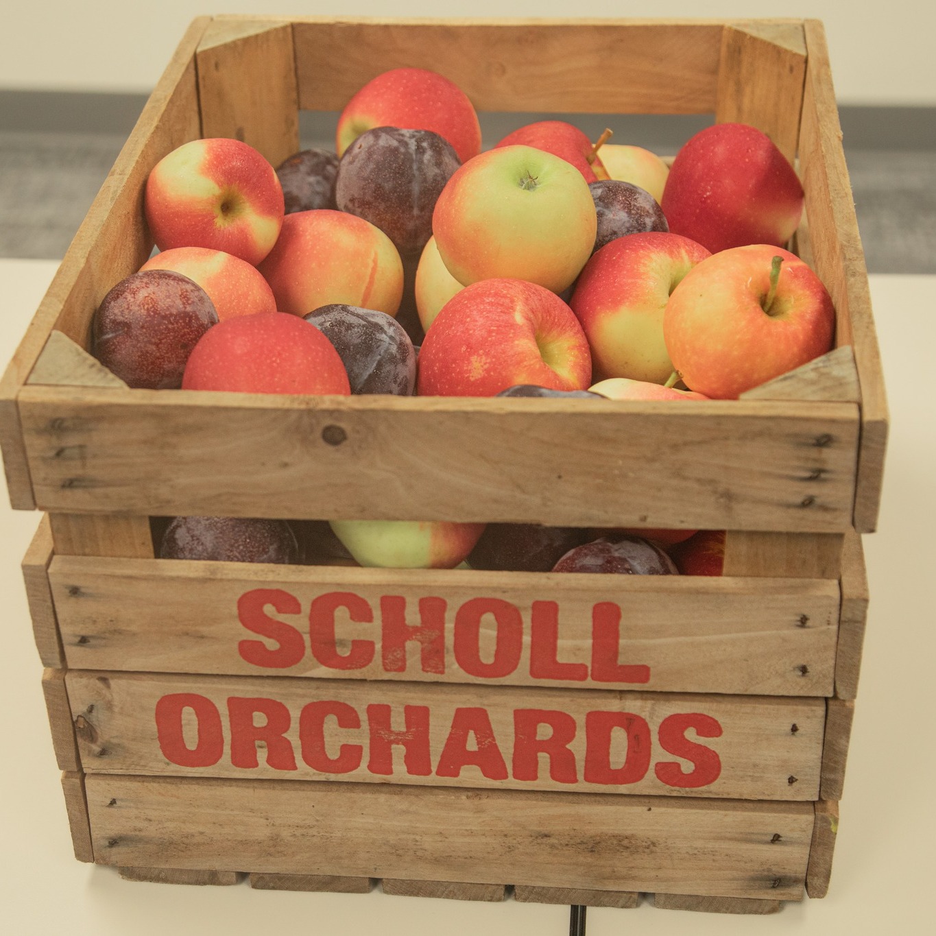 apples in a wooden crate
